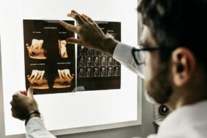dentist examining x-rays